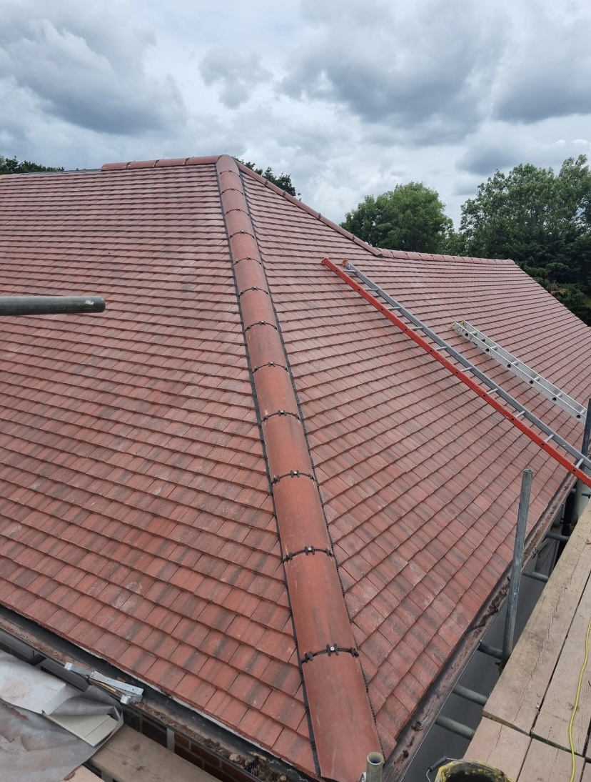 What tradesman fixes guttering